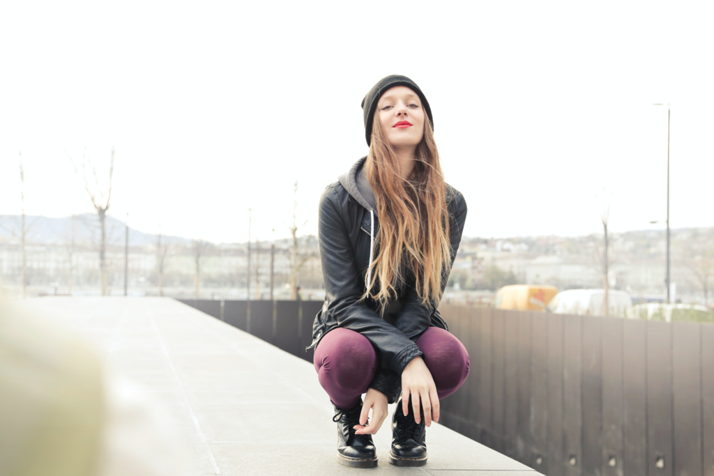 Woman wearing hat and jacket
