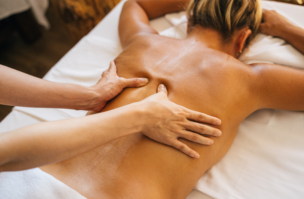 Woman in a spa receiving a massage